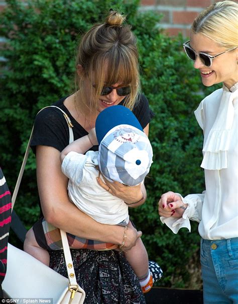 Jaime King and husband Kyle Newman bump into Dakota Johnson while out with baby James in NY ...