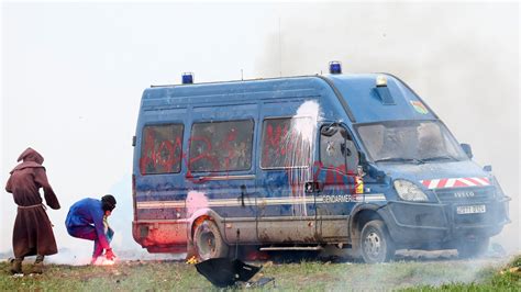 France protests: Demonstrator in critical condition and 16 officers injured as French police ...