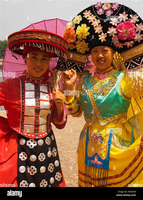 Young girls of the Zhuang Miao minority people in traditional dress in ...