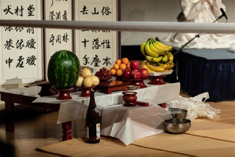 Offerings on stage at Ssitkimkut, the Korean shaman ritual of the dead ...