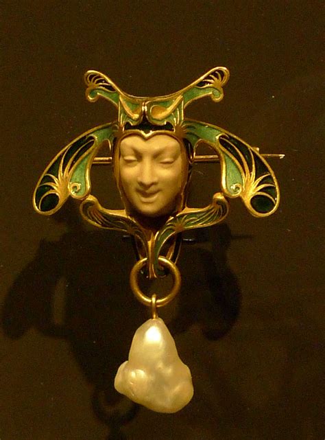 Lalique 1898-99 Brooch in the Shape of a Jester: gold/ enamel/ baroque pearl. rijksmuseum.nl ...