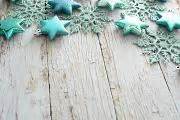 Photo of Rustic Christmas border on blue textured wood | Free christmas images