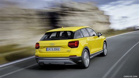 2017 Audi Q2 TDI (Color: Vegas Yellow) - Rear | Caricos