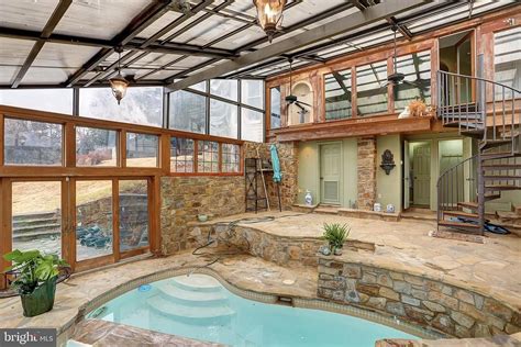 Has an indoor pool and an outdoor pool! Circa 1840. Five acres in ...