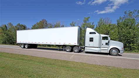 Side View Of A Semi Tractor Trailer Truck On Highway Stock Photo - Download Image Now - iStock