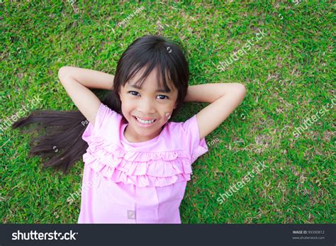 Portrait Smiling Little Girl Lying On Stock Photo 99390812 | Shutterstock