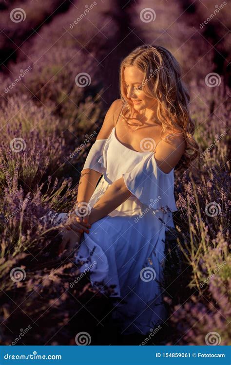 Beautiful Girl on the Lavender Field. Beautiful Woman in the Lavender Field on Sunset Stock ...