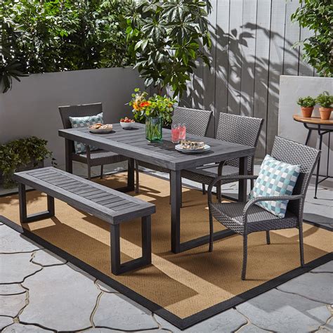 Zoe Outdoor 6 Piece Acacia Wood Dining Set with Bench and Wicker Stackable Chairs, Sandblast ...