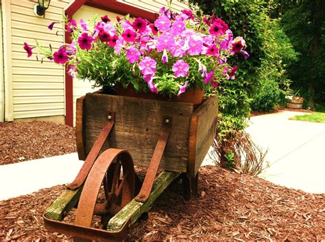 22 Wooden Wheelbarrow Garden Decor Ideas You Cannot Miss | SharonSable