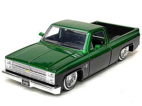 Jada 34311 1985 Chevrolet C10 Pickup Truck Lowrider Green Metallic ...