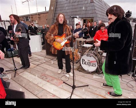 Bootleg Beatles play on roof Stock Photo - Alamy