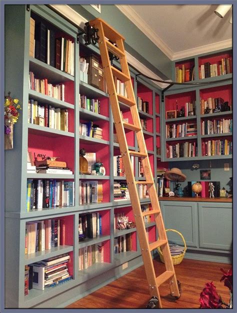 rolling library ladder for bookshelf wall. Could DIY? Add shelf halfway ...