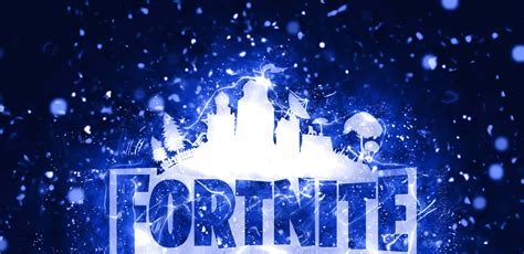 Download Fortnite Logo With Snow Falling On It Wallpaper | Wallpapers.com