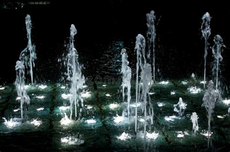 Water fountain at night stock photo. Image of water, abstract - 17429016