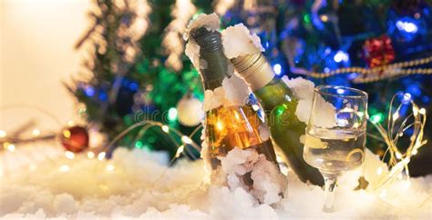 Christmas Celebration Wine and Glass of Wine on Snow Stock Image - Image of gold, lights: 262730225