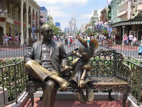 Sharing the Magic statue of Roy O. Disney sitting with Minnie Mouse in ...