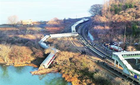 Passenger train derails in New York City,killing 4,injuring 67 | News Archive News - The Indian ...