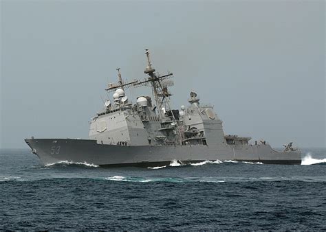 USS Mobile Bay (CG-53) pulls a hard turn to starboard, sometime during one of her deployments in ...