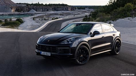 2022 Porsche Cayenne Turbo GT (Color: Jet Black Metallic) - Front Three-Quarter | Caricos