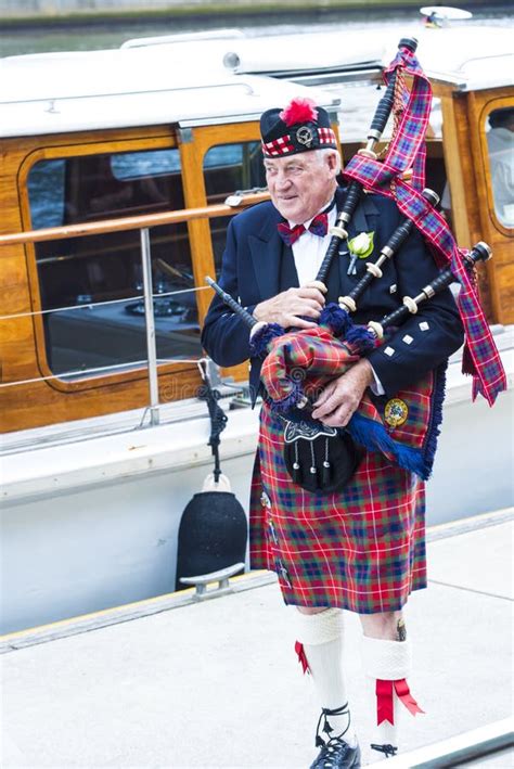 Scottish Man with Bagpipes and Kilt Editorial Photography - Image of ...