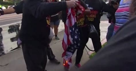 Violence Breaks Out as Anti-Trump Protesters Burn American Flag During ...