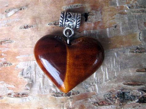 Wooden heart pendant. Made out of birch burl. by JonasOlsenWoodcraft on DeviantArt