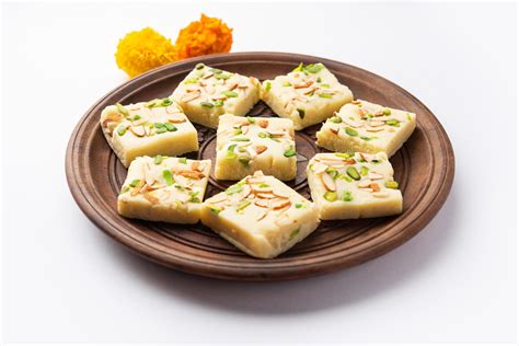 Milk powder barfi also known as Mava burfi, white Khoya burfi or Barfee, Indian Sweet food ...