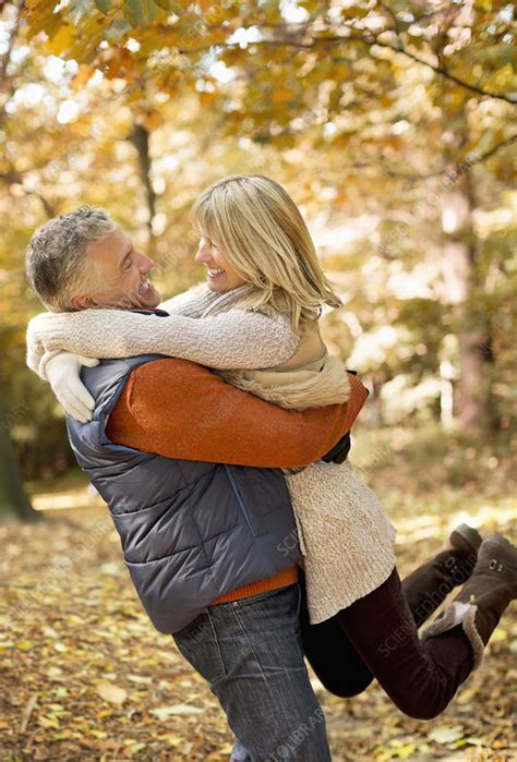 Older couple hugging in park - Stock Image - F013/7736 - Science Photo ...