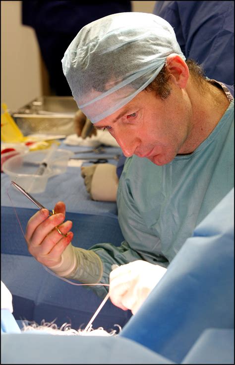 A urology surgeon performs an operation at the Treatment Centre at the Chelsea and Westminster ...