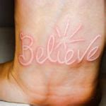 Lettering Tattoo Under The Chin - Best Tattoo Ideas Gallery