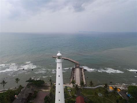 Banten, Indonesia 2021-- Aerial view of Lighthouse sea rock sunset ...