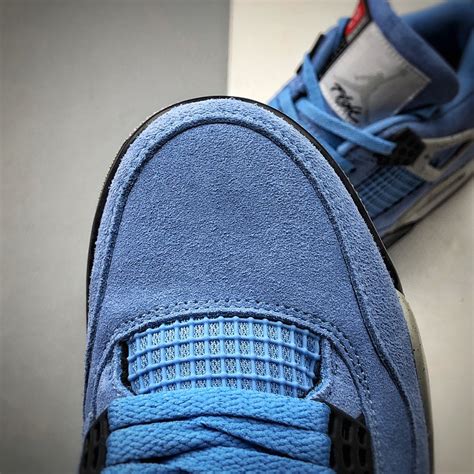 Jordan 4 Retro University Blue – NIKES SHOP