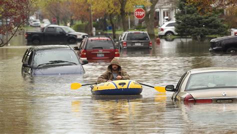 Record rainfall spurs flooding; now, more rain in forecast