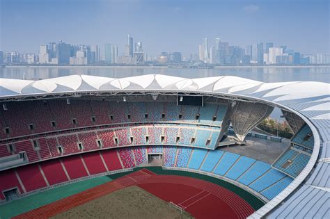 NBBJ models Hangzhou Olympic Sports Center stadium on lotus flowers | Hangzhou, Stadium, Olympic ...