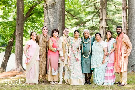 photo of bride and groom's immediate family in their traditional Indian ...