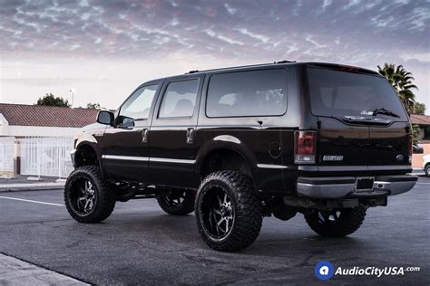 Ford Excursion | 22x12 Full Throttle Wheels FT1 black machine | 37x13.5x22 RBP MT Tires ...