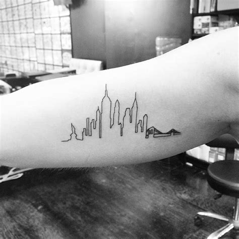 New York skyline tattoo on the forearm - Tattoogrid.net