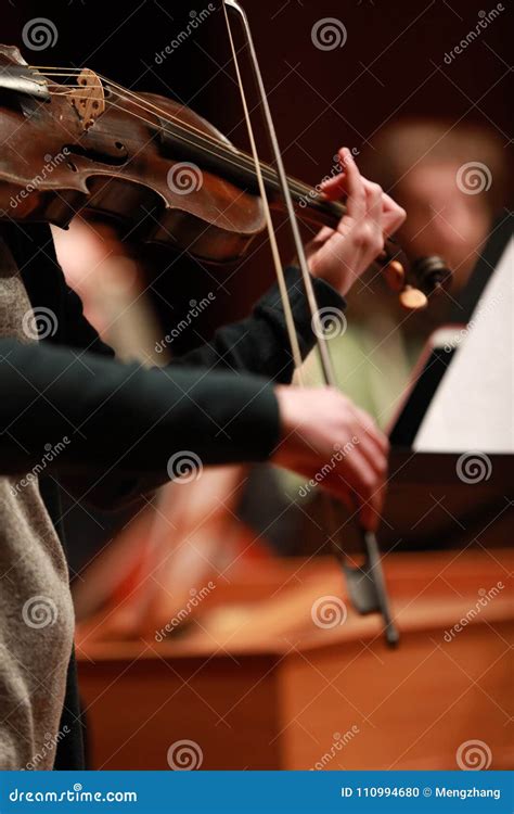 Classical Music. Violinists in Concert. Stringed, Violinist.Closeup of Musician Playing the ...