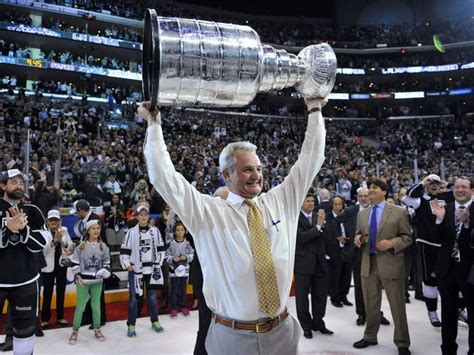 Darryl Sutter raising the Stanley Cup at Staples Center. Kings take 3-2 ...