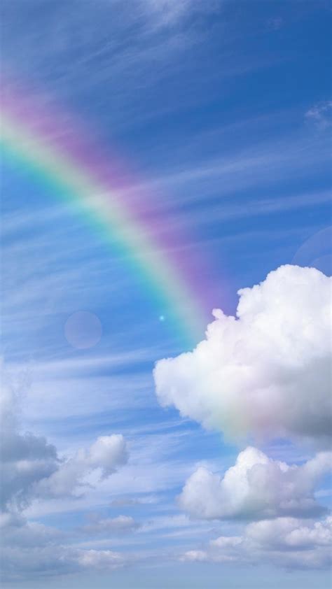 Rainbow over the blue sky Wallpaper Download 720x1280