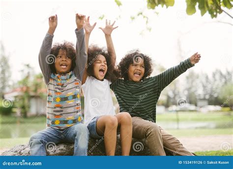 Happy African American Man Flexing Arm Muscle Stock Image ...