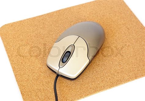 Computer mouse and mousepad on white ... | Stock image | Colourbox