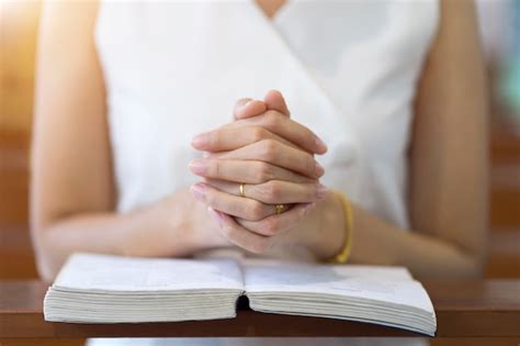 Premium Photo | Woman hands praying on a holy bible in church for faith concept, spirituality ...