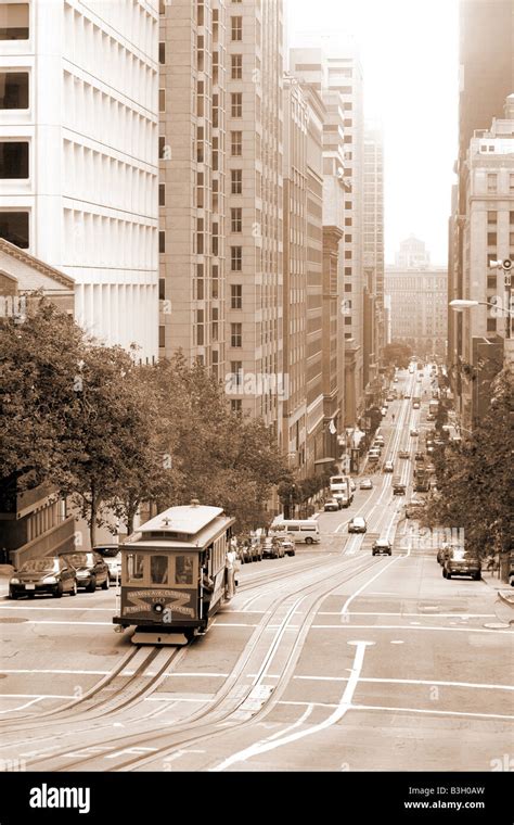 Cable car in a street of San Francisco Stock Photo - Alamy