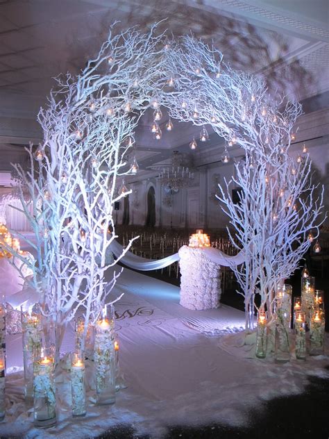 Stunning winter themed ceremony arch w/ candle accents~ Amaryllis Event ...