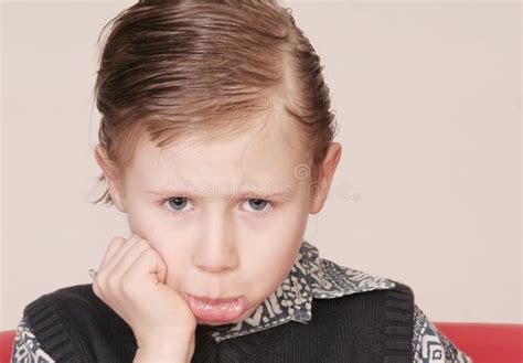 Sullen young boy stock photo. Image of displeased, displeasure - 1839988