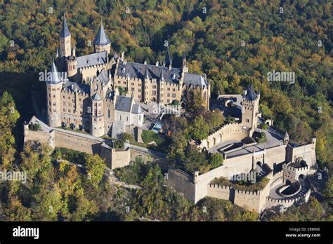 HOHENZOLLERN CASTLE (aerial view). Castle on a forested hill with autumnal colors. Hechingen ...