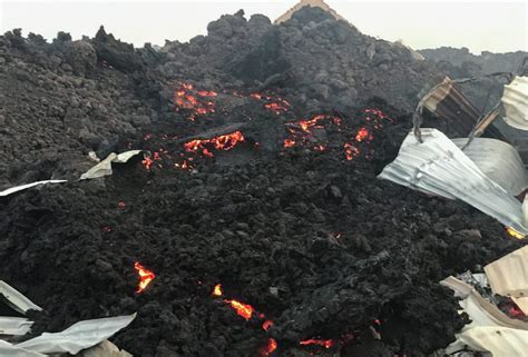 Smouldering lava deposited by the eruption of Mount Nyiragongo volcano ...