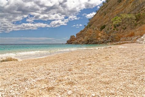 Cala Mariolu Beach - Italy - Sardinia Stock Photo - Image of cliff ...