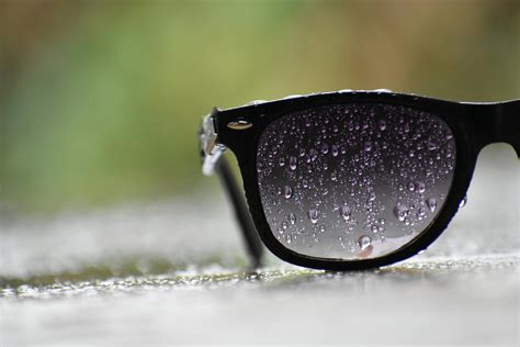 Black Sunglasses With Water Droplets · Free Stock Photo